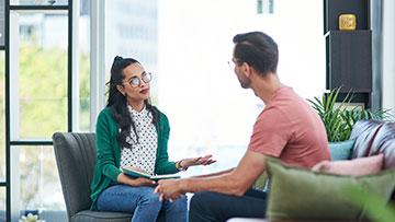 Mental Health Professional listening to her client.